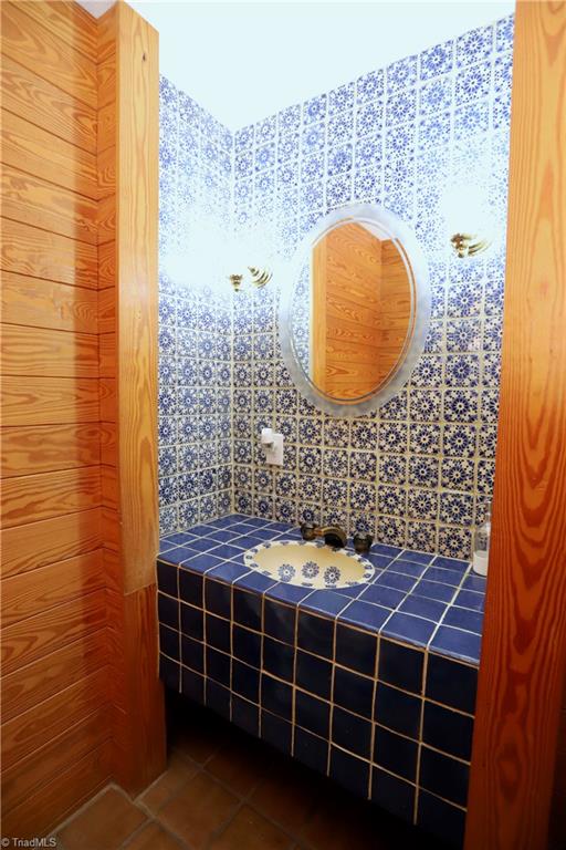 4611 East Perquimans Road Greensboro, NC 27407 - Photo 39 of 49 First floor half bath