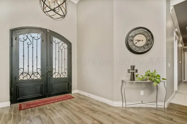 a view of a hallway with entryway