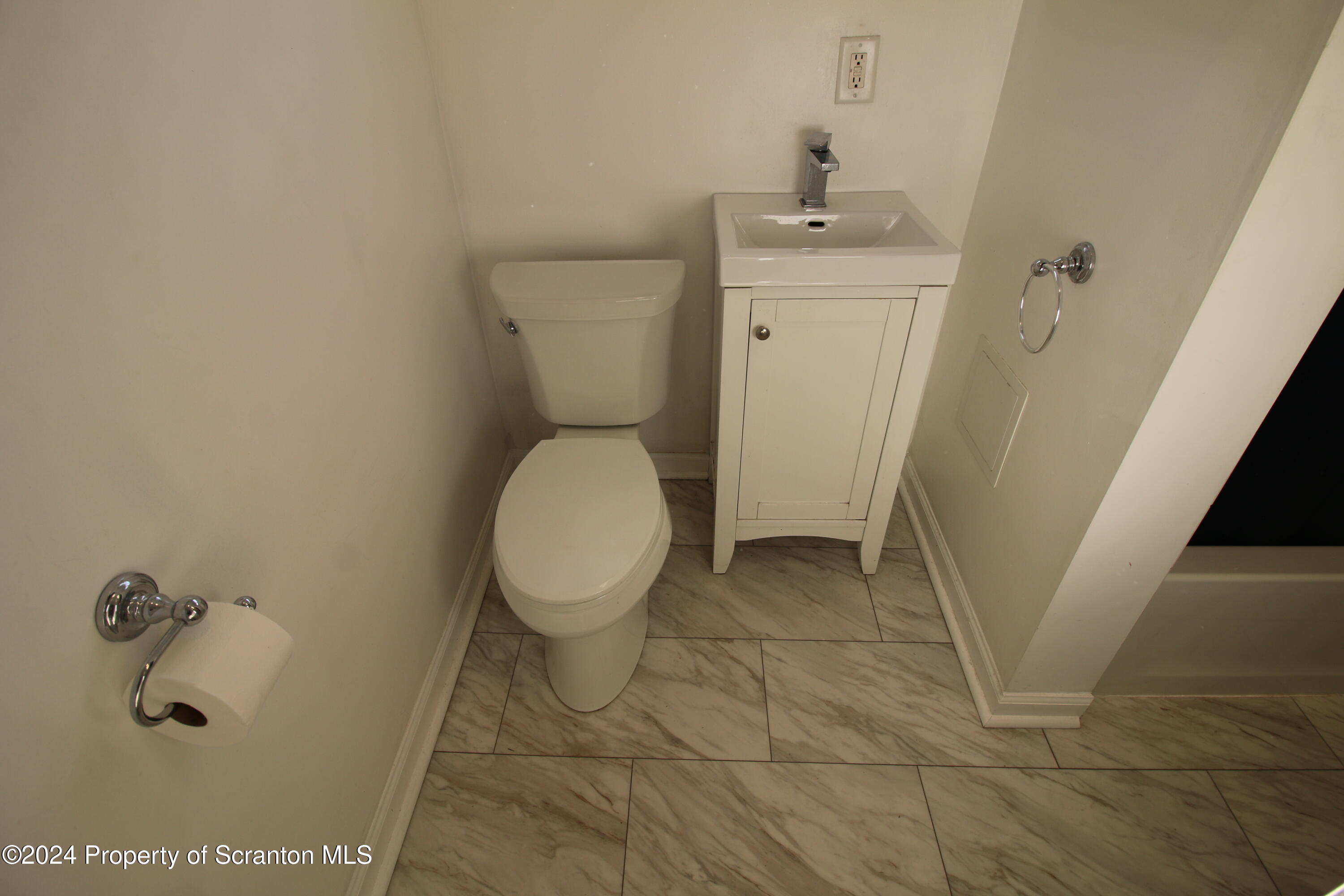 1105 Rundle Street Scranton, PA 18504 - Photo 29 of 30 a bathroom with a sink and a toilet