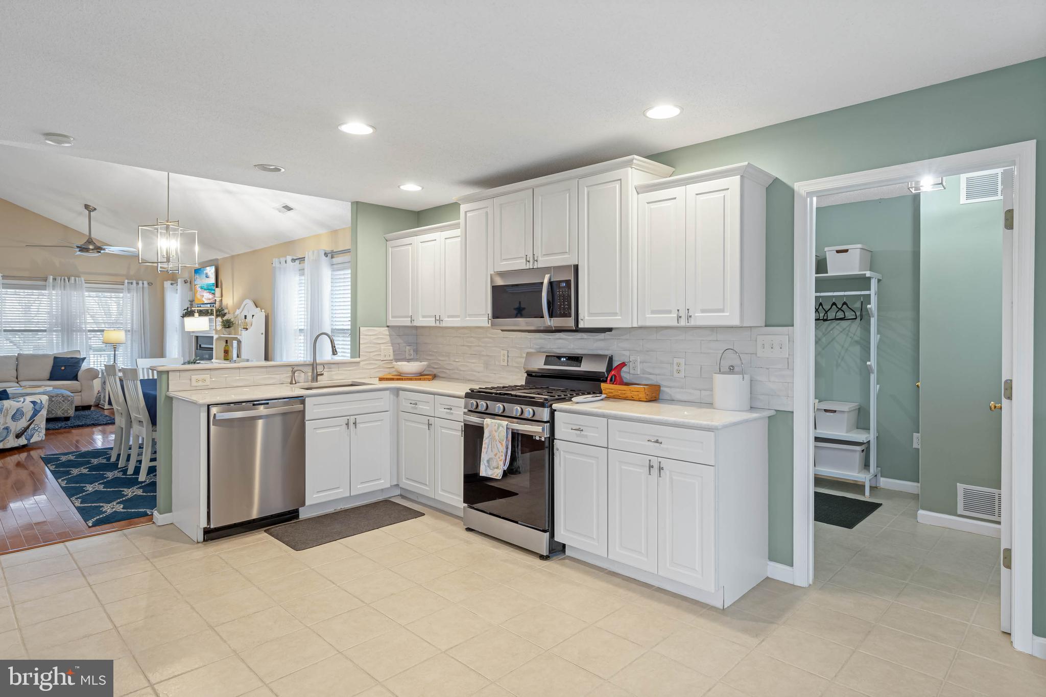 16359 John Rowland Trail Milton, DE 19968 - Photo 8 of 38 Laundry situated between kitchen & garage.