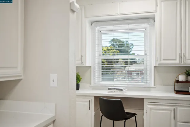 a kitchen with a sink and a window