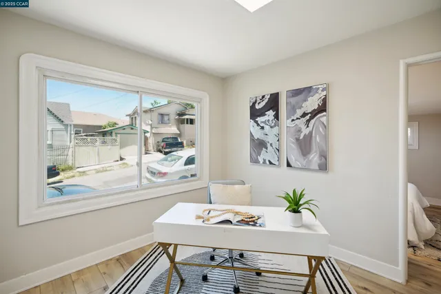 a workspace with furniture and window