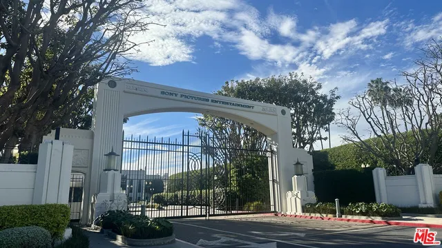 a terrace with outdoor seating and city view