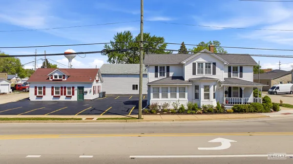 a view of multiple houses with a street