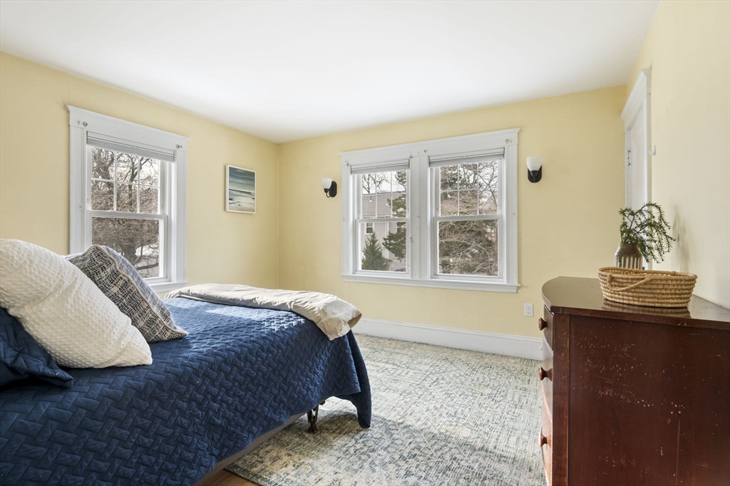 71 Governors Road Milton, MA 02186 - Photo 18 of 25 a bedroom with a bed and window