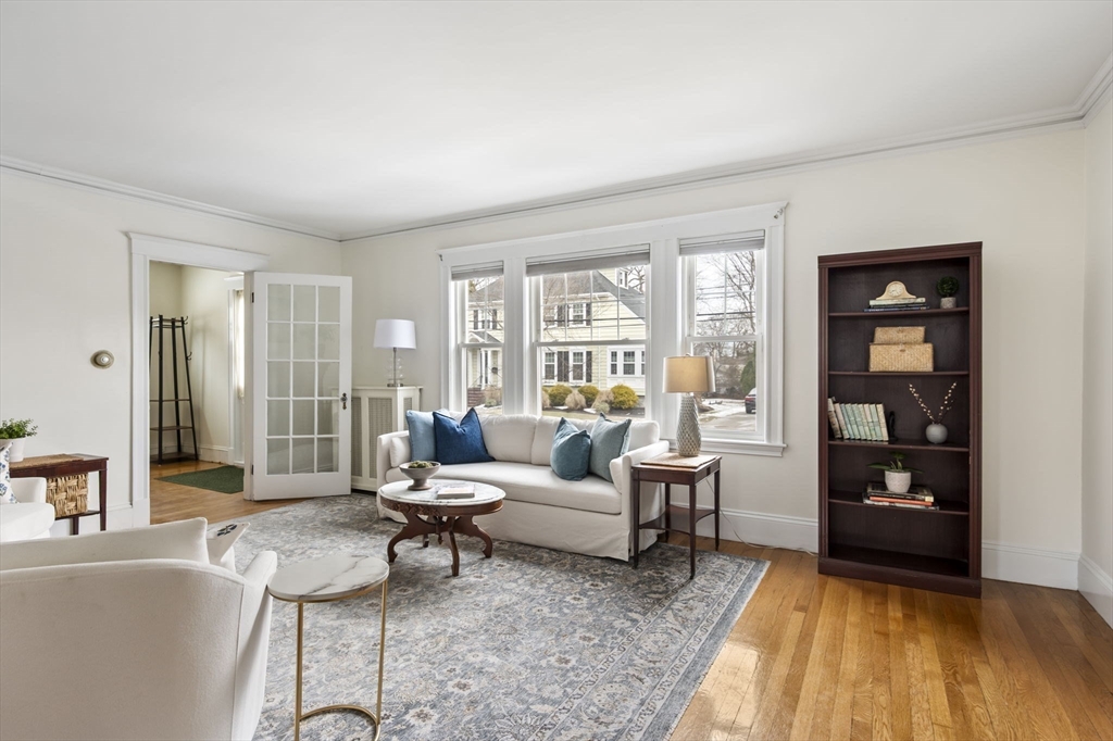 71 Governors Road Milton, MA 02186 - Photo 7 of 25 a living room with furniture and a window