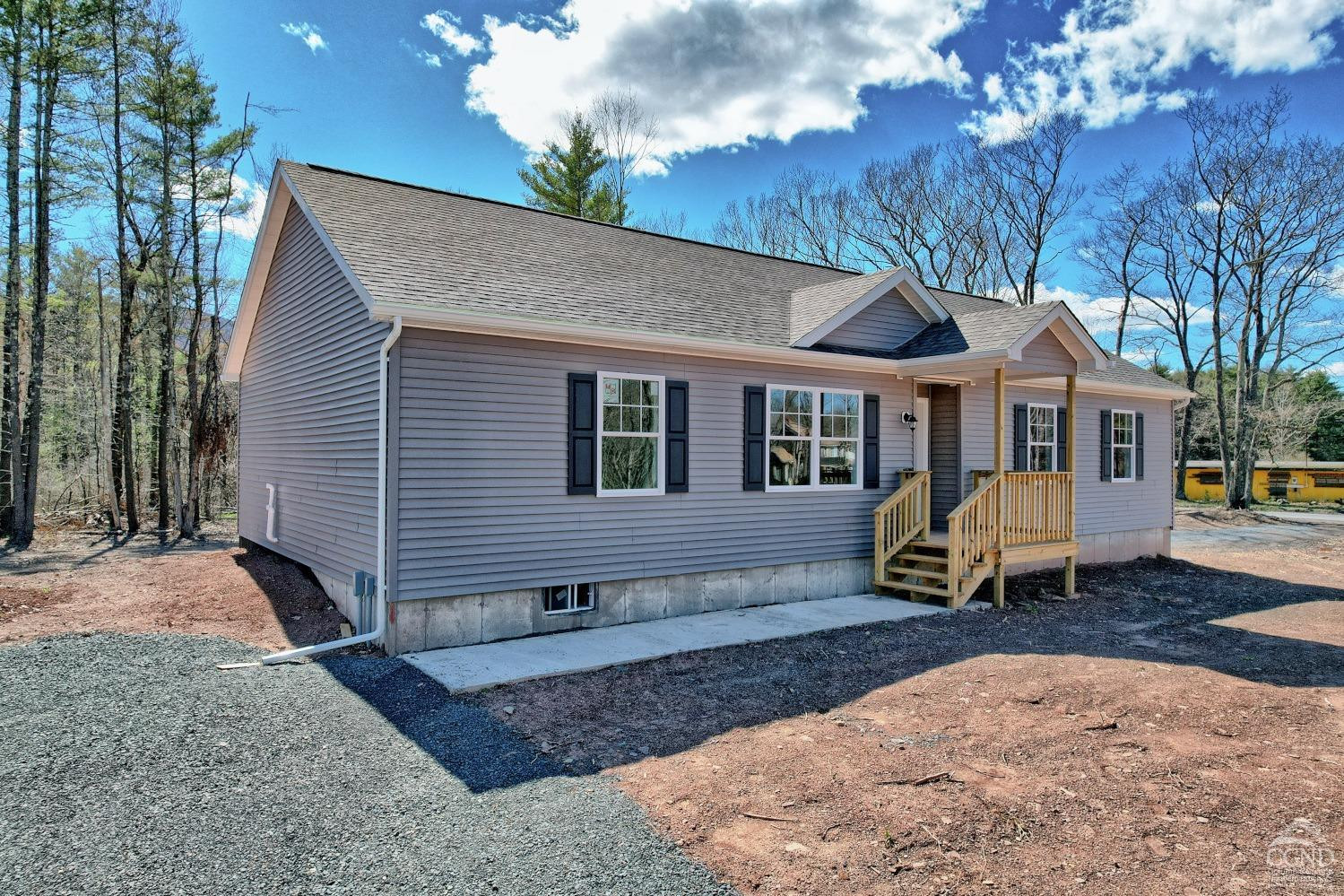 635 Rt 20 Acra, NY 12405 - Photo 5 of 87 a front view of a house with a yard outdoor seating and barbeque oven