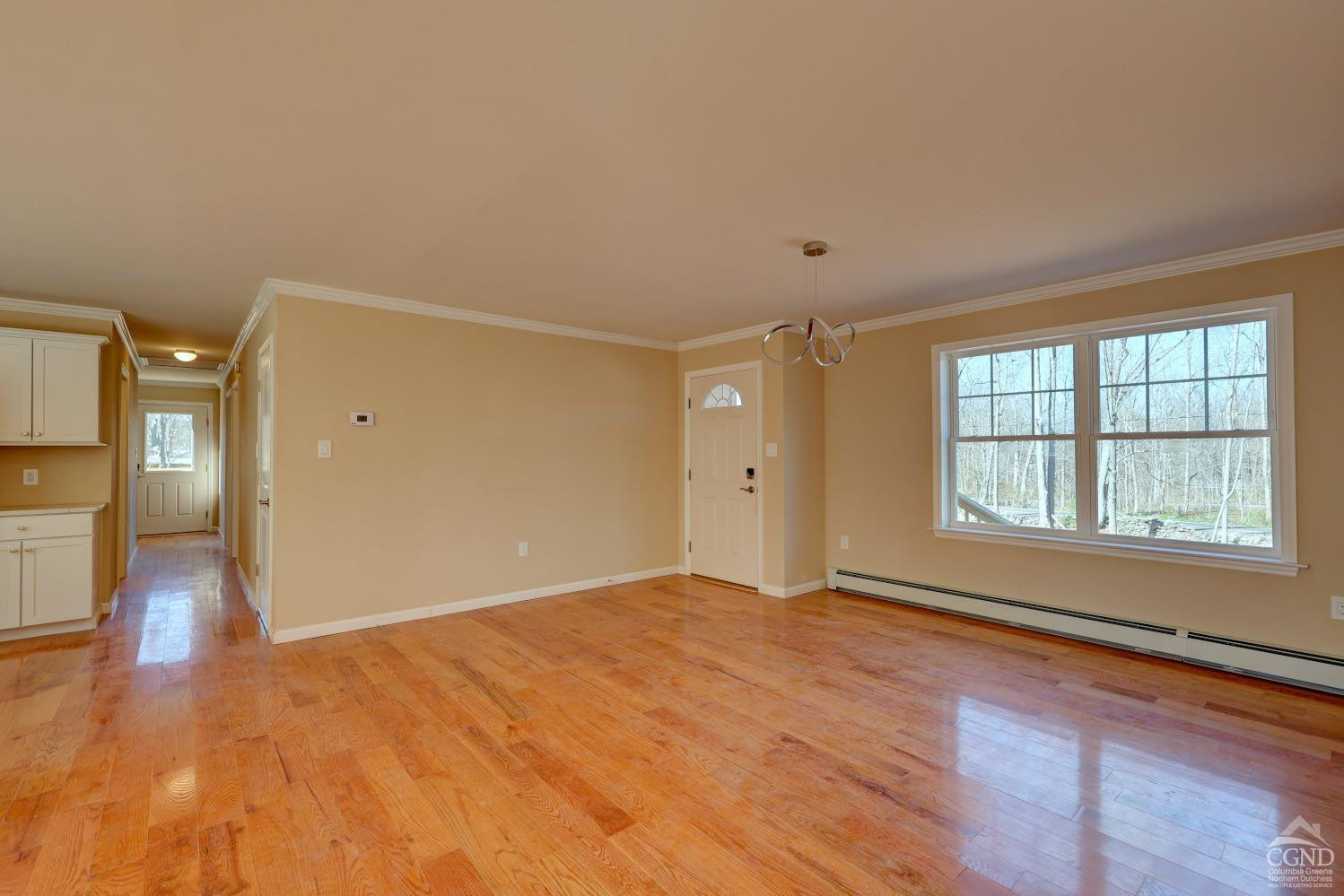 635 Rt 20 Acra, NY 12405 - Photo 54 of 87 a view of an empty room with a window and wooden floor