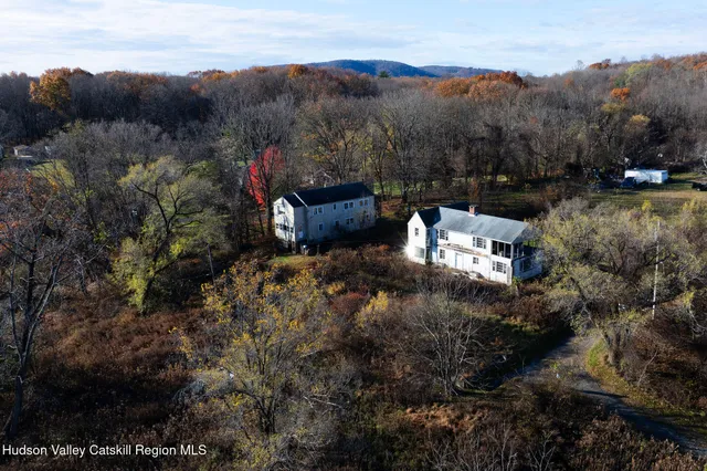 a view of a city with mountains in the background