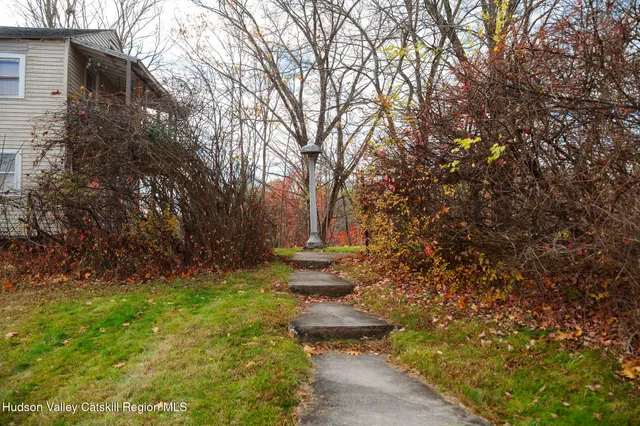a backyard of a house with lots of green space