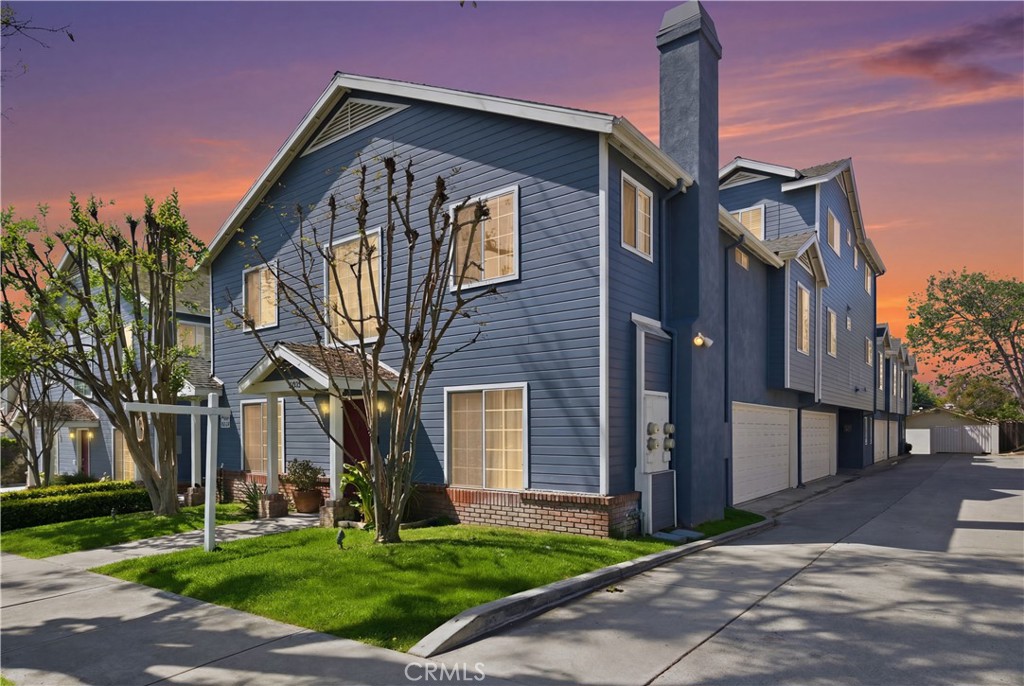 8317 College Avenue Whittier, CA 90605 - Photo 1 of 41 a front view of a house with a yard