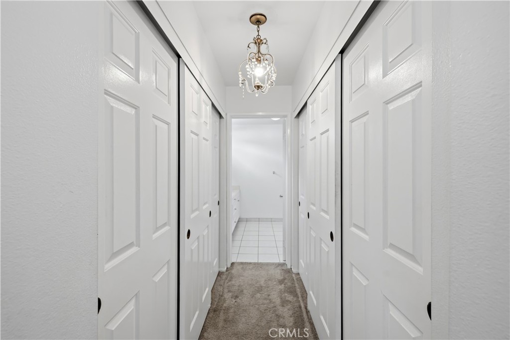 8317 College Avenue Whittier, CA 90605 - Photo 20 of 41 a very nice looking hallway with a elevator
