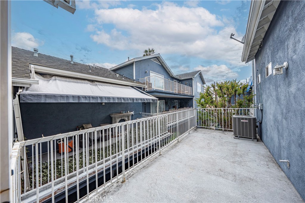 8317 College Avenue Whittier, CA 90605 - Photo 30 of 41 a view of a house with wooden fence