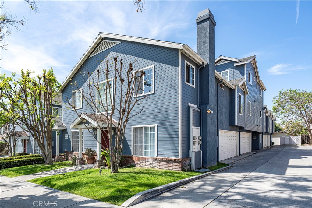 8317 College Avenue Whittier, CA 90605 - Photo 5 of 41 a front view of a house with garden