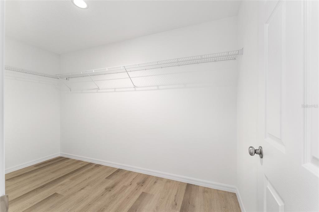 13119 Northeast 7th Loop Silver Springs, FL 34488 - Photo 35 of 51 a view of a room with wooden floor