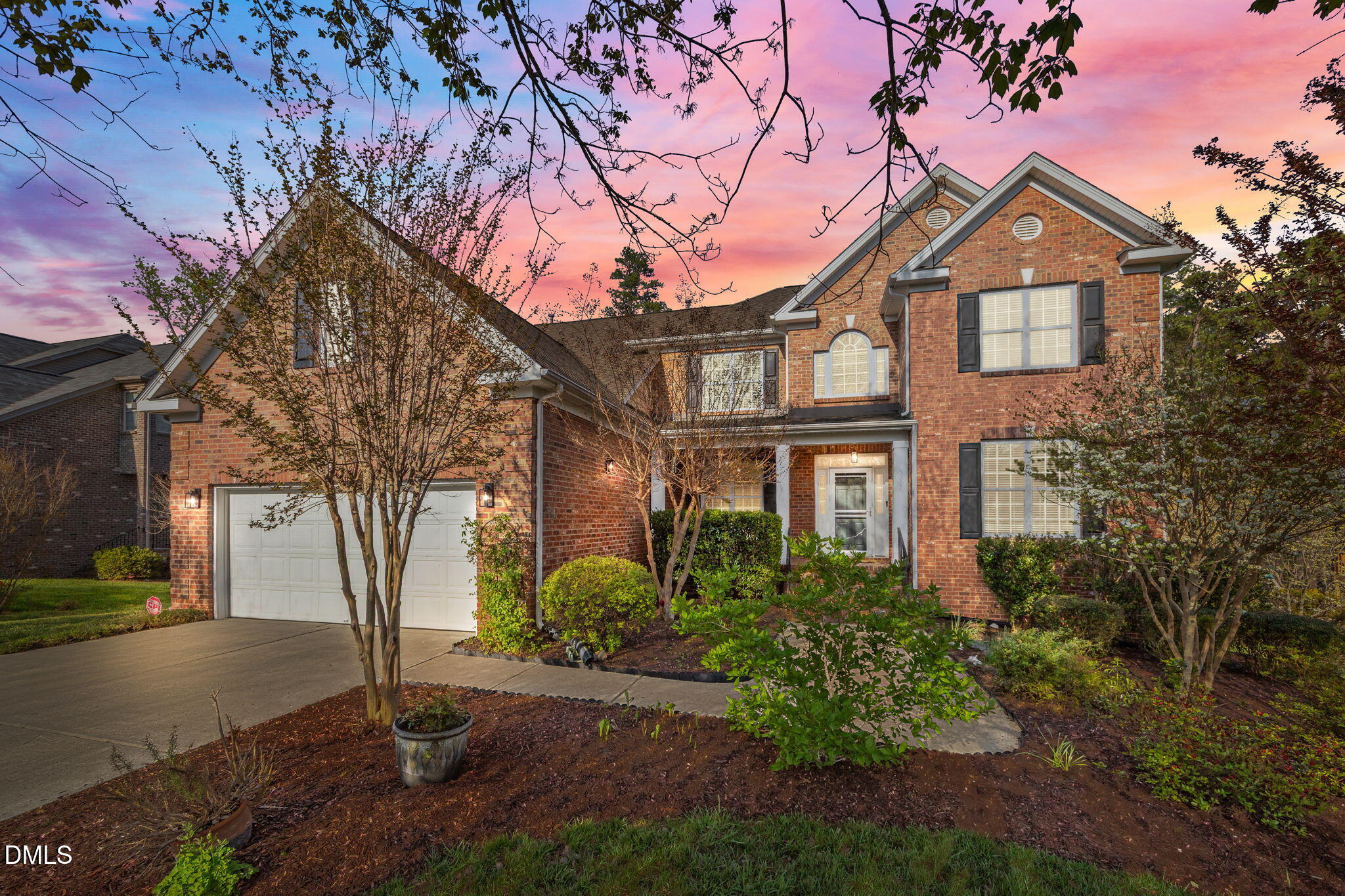 5309 Lyon Farm Drive Durham, NC 27713 - Photo 1 of 68 a front view of a house with garden