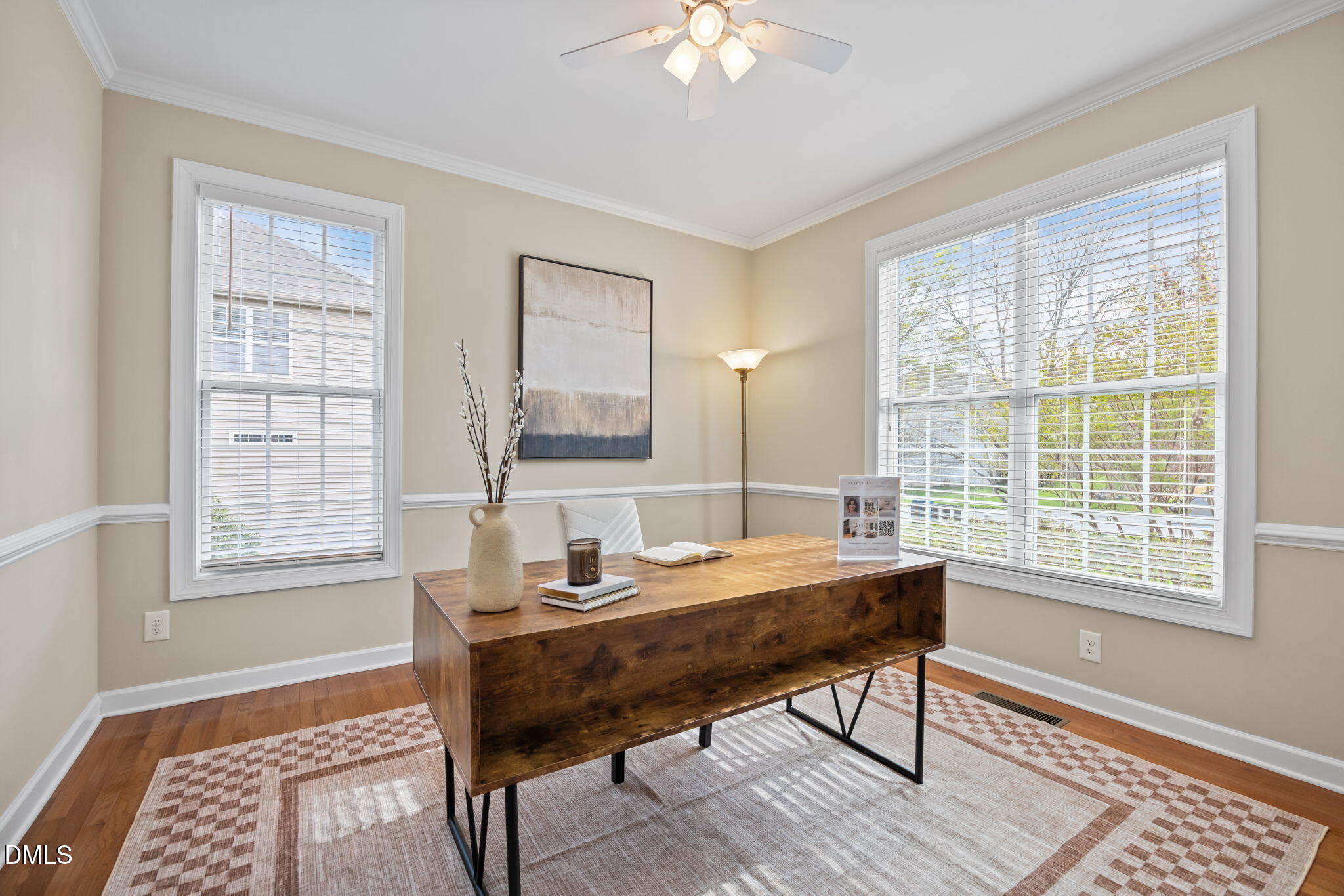 5309 Lyon Farm Drive Durham, NC 27713 - Photo 16 of 68 a view of a workspace with furniture and a window