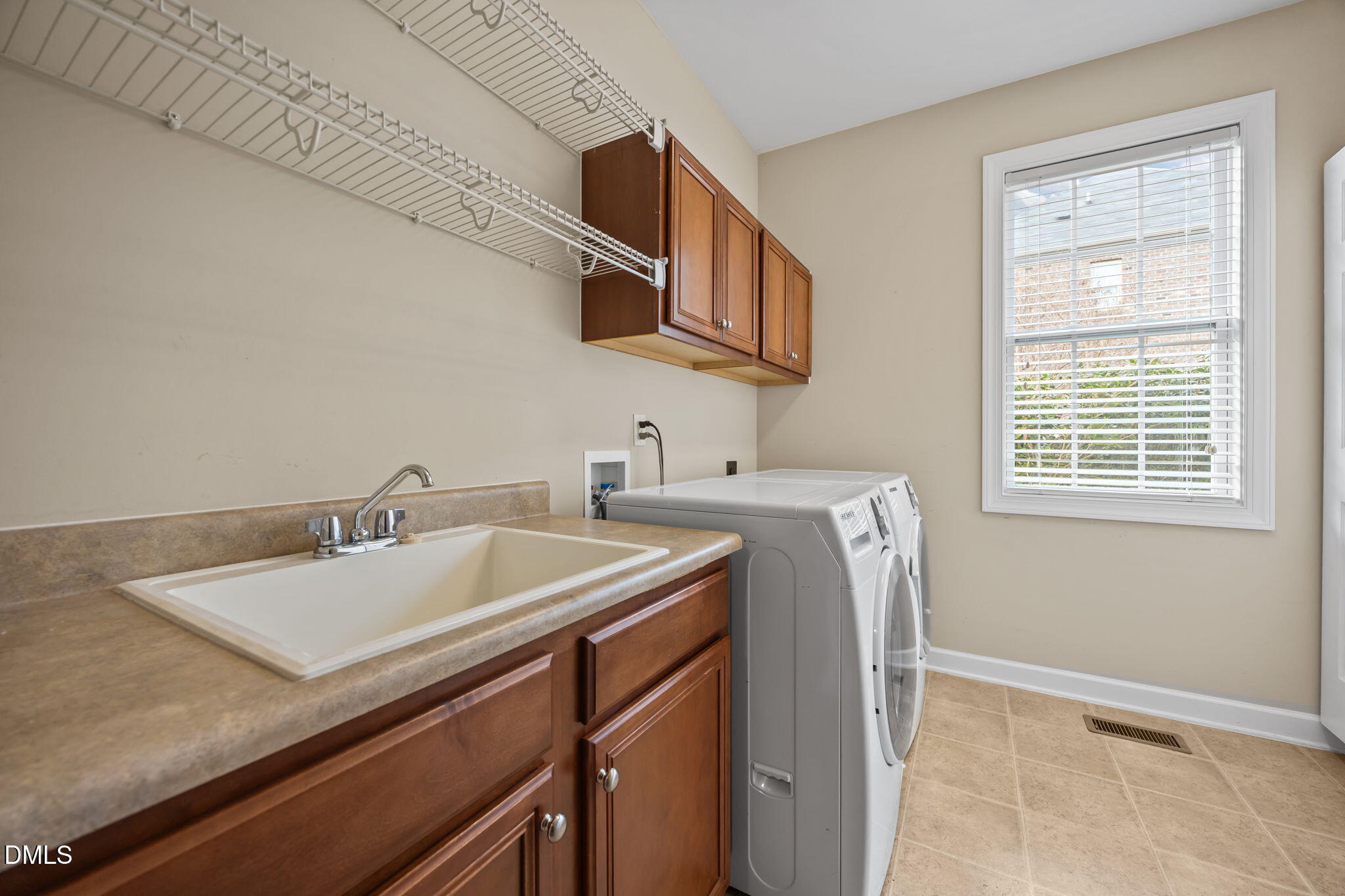 5309 Lyon Farm Drive Durham, NC 27713 - Photo 23 of 68 a utility room with dryer and washer