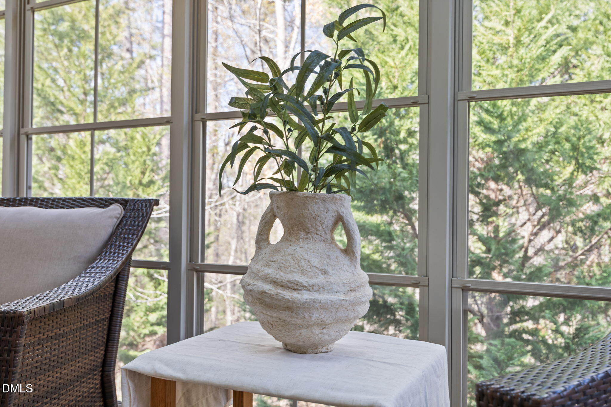 5309 Lyon Farm Drive Durham, NC 27713 - Photo 26 of 68 a view of a vase of flowers sitting on a table