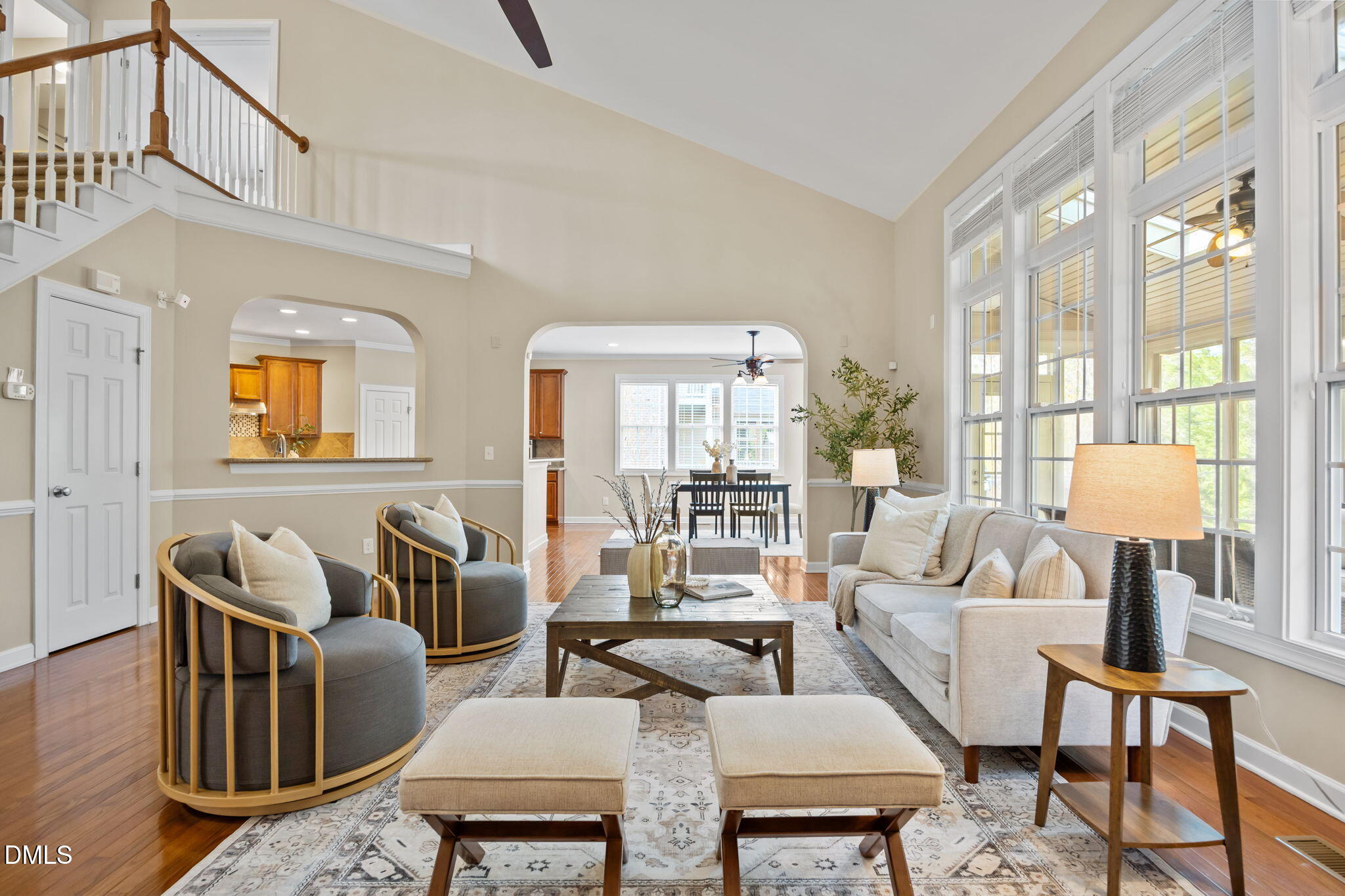 5309 Lyon Farm Drive Durham, NC 27713 - Photo 29 of 68 a living room with furniture and a floor to ceiling window