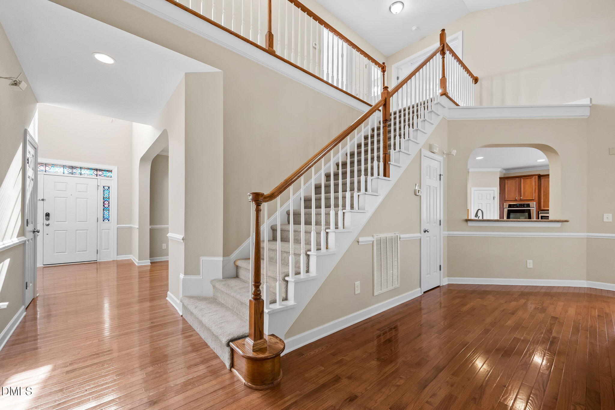 5309 Lyon Farm Drive Durham, NC 27713 - Photo 30 of 68 a view of entryway and hall with wooden floor