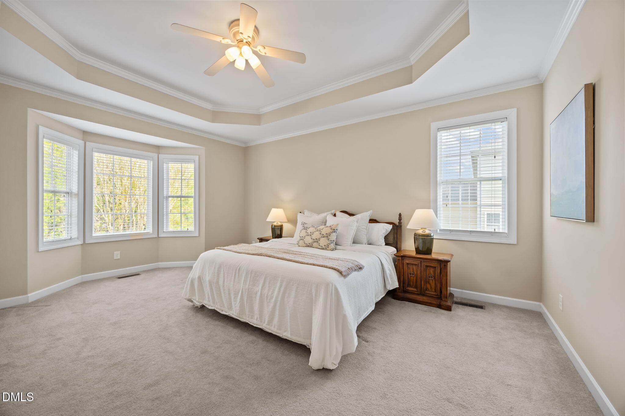 5309 Lyon Farm Drive Durham, NC 27713 - Photo 33 of 68 a spacious bedroom with a bed and a window