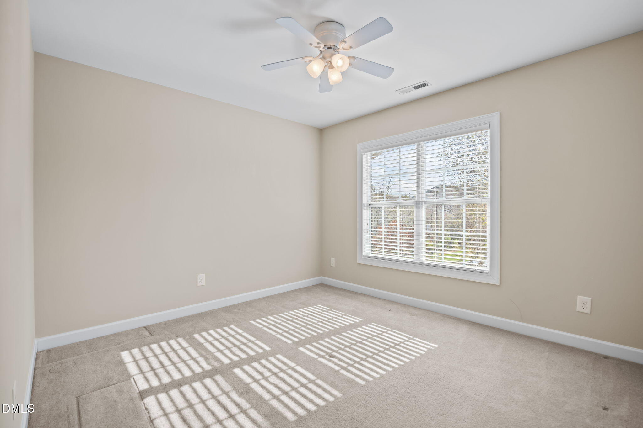 5309 Lyon Farm Drive Durham, NC 27713 - Photo 43 of 68 a view of an empty room with a window