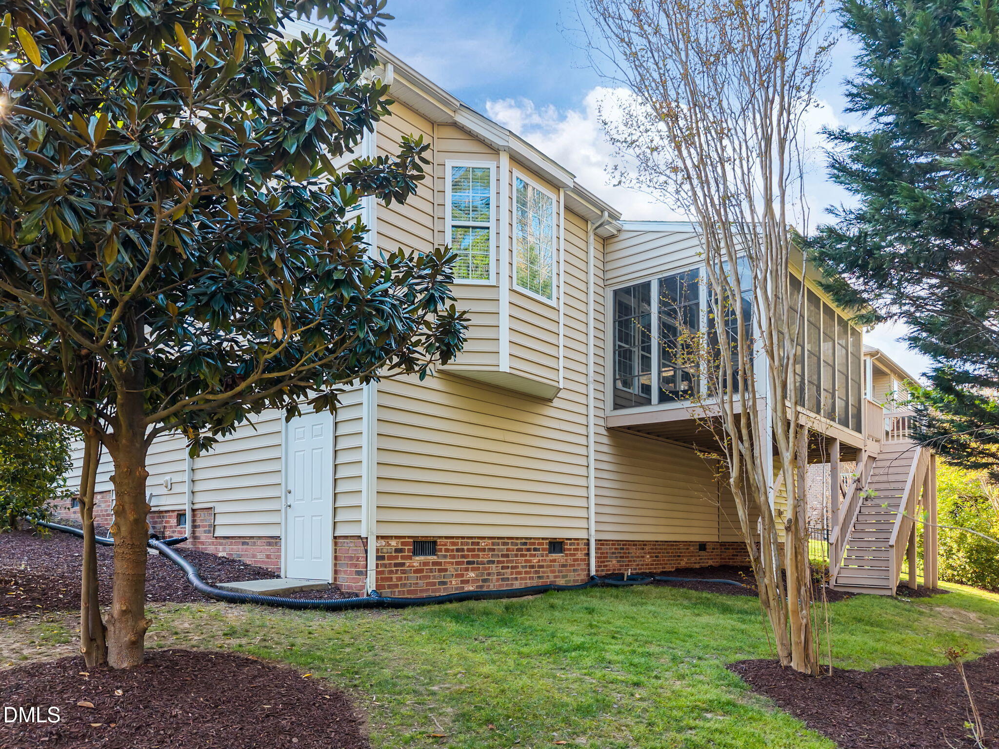 5309 Lyon Farm Drive Durham, NC 27713 - Photo 60 of 68 a view of a house with a yard