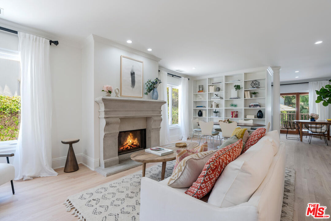 9044 Lloyd Place West Hollywood, CA 90069 - Photo 11 of 35 a living room with furniture and a fireplace
