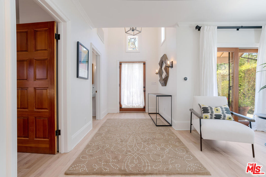 9044 Lloyd Place West Hollywood, CA 90069 - Photo 12 of 35 a view of an entryway with wooden floor