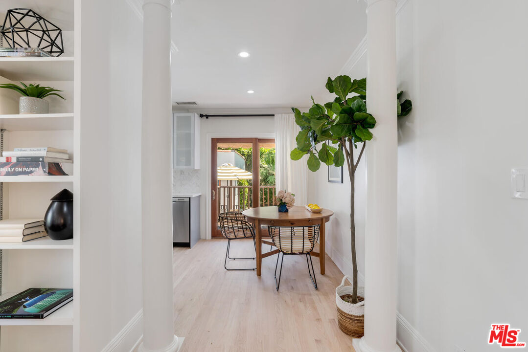 9044 Lloyd Place West Hollywood, CA 90069 - Photo 13 of 35 a living room with furniture and a potted plant