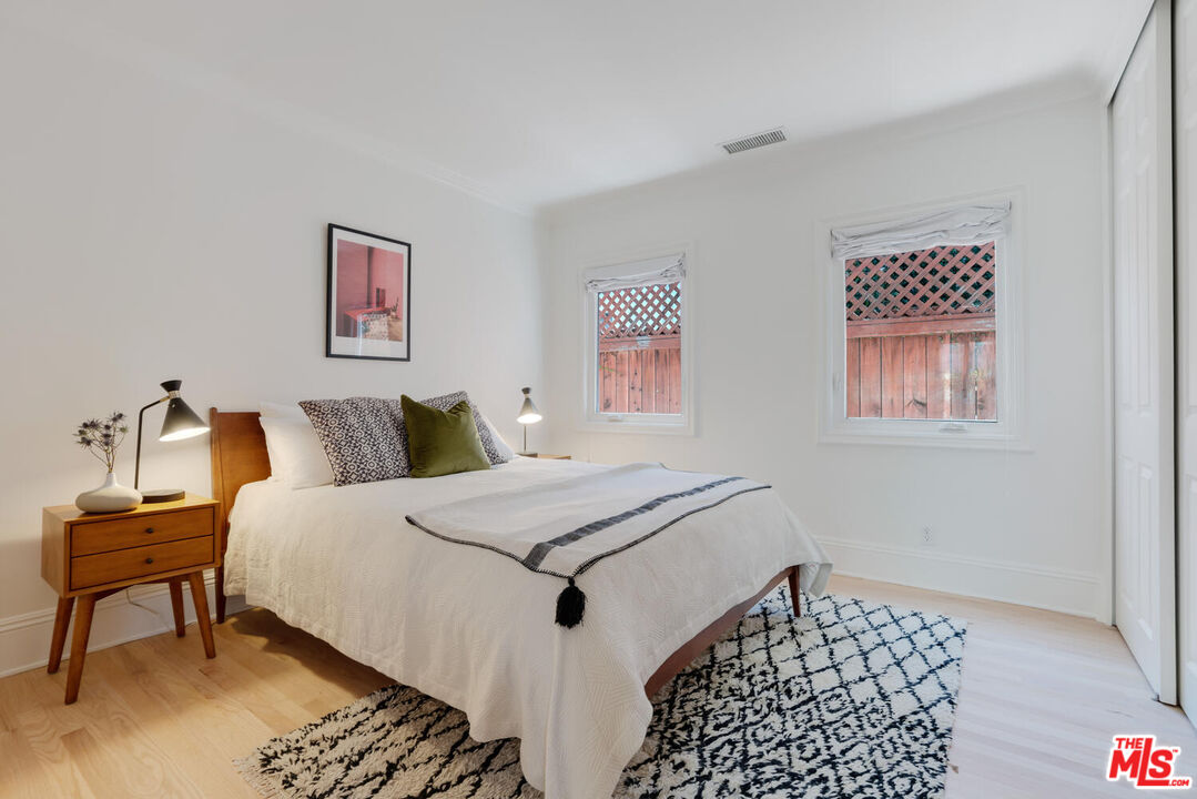 9044 Lloyd Place West Hollywood, CA 90069 - Photo 22 of 35 a bedroom with bed and a window