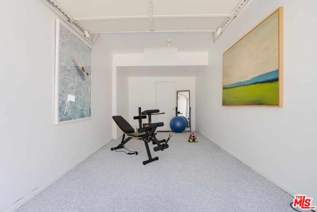 9044 Lloyd Place West Hollywood, CA 90069 - Photo 24 of 35 a living room with furniture and a window