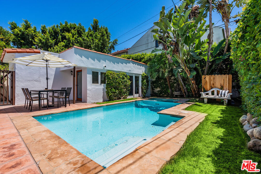 9044 Lloyd Place West Hollywood, CA 90069 - Photo 29 of 35 a view of a backyard with a patio and a garden