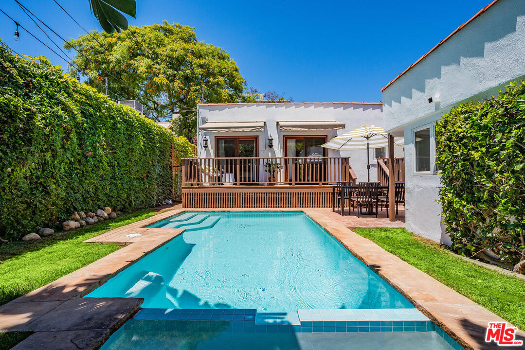 9044 Lloyd Place West Hollywood, CA 90069 - Photo 30 of 35 a view of an house with swimming pool and yard