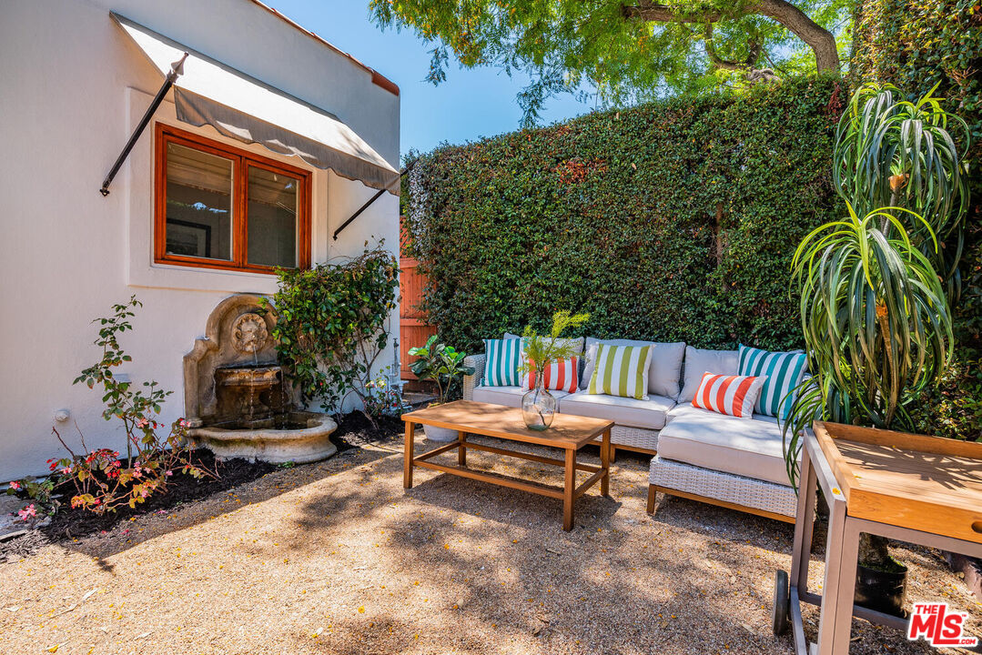 9044 Lloyd Place West Hollywood, CA 90069 - Photo 32 of 35 a backyard of a house with seating space