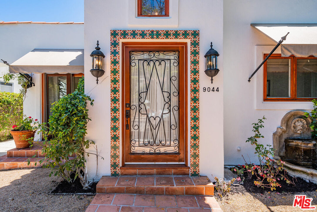9044 Lloyd Place West Hollywood, CA 90069 - Photo 4 of 35 a front view of a house with garden