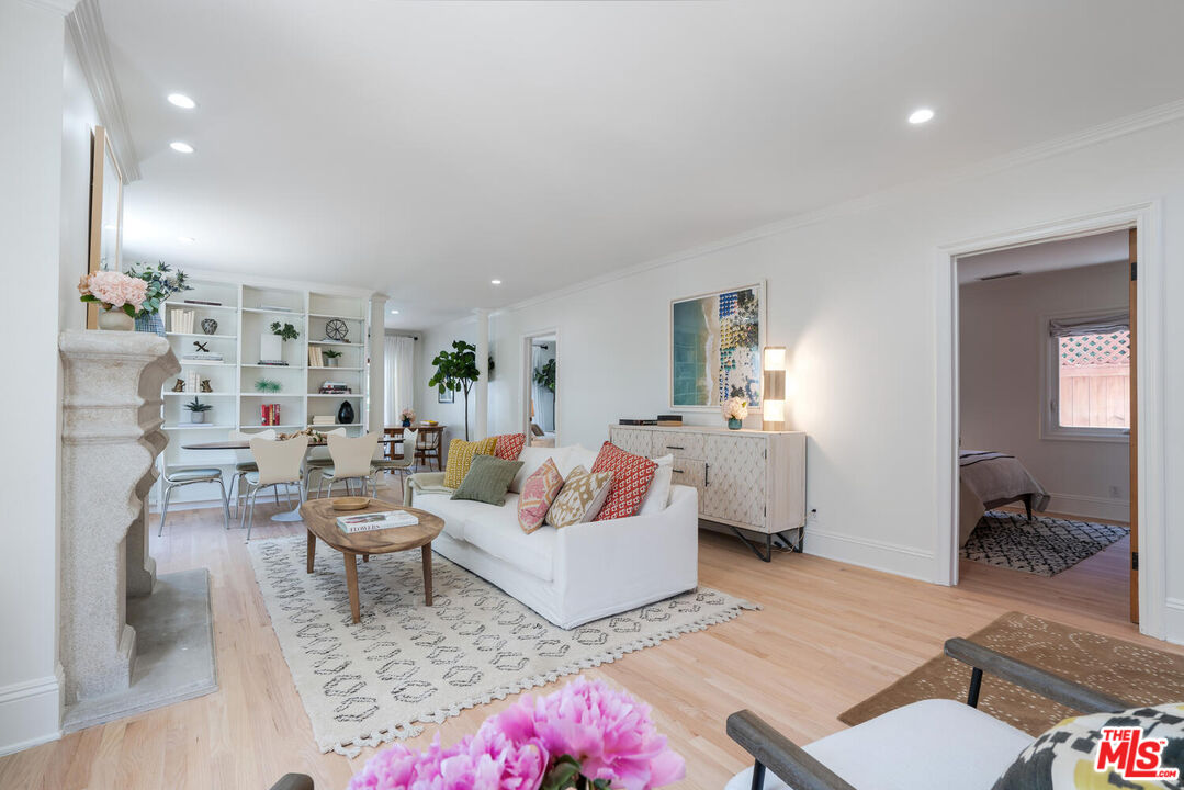 9044 Lloyd Place West Hollywood, CA 90069 - Photo 6 of 35 a living room with furniture and a couch