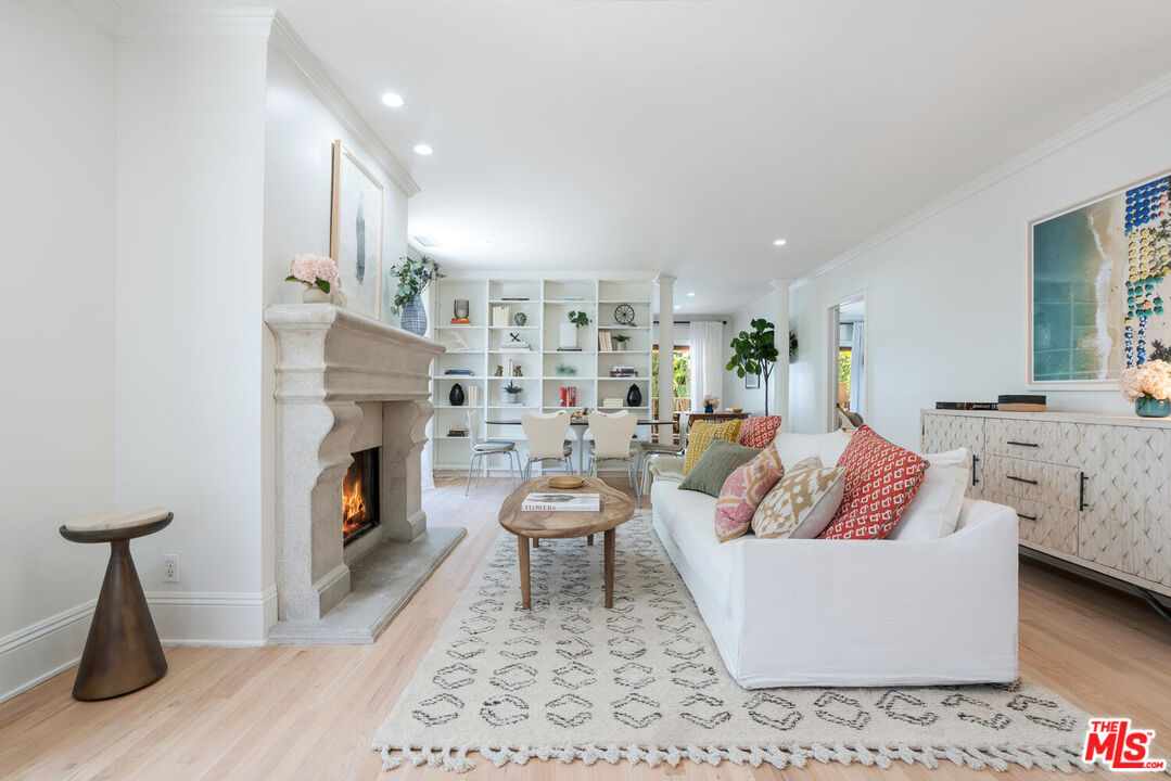 9044 Lloyd Place West Hollywood, CA 90069 - Photo 8 of 35 a living room with furniture and a fireplace