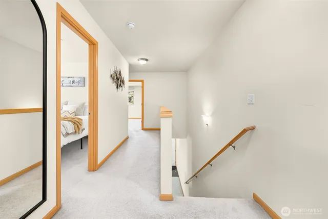 a view of a hallway with windows