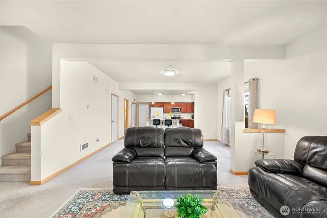 a living room with furniture and a couch