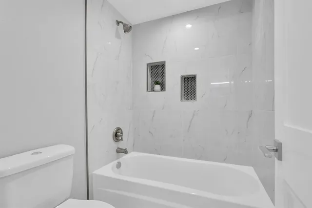 a bathroom with a bathtub