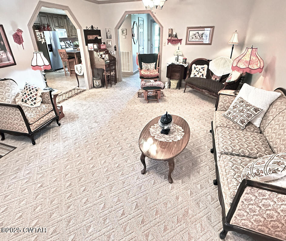 153 Timber Ridge Drive Lexington, TN 38351 - Photo 14 of 29 a living room with furniture and a table