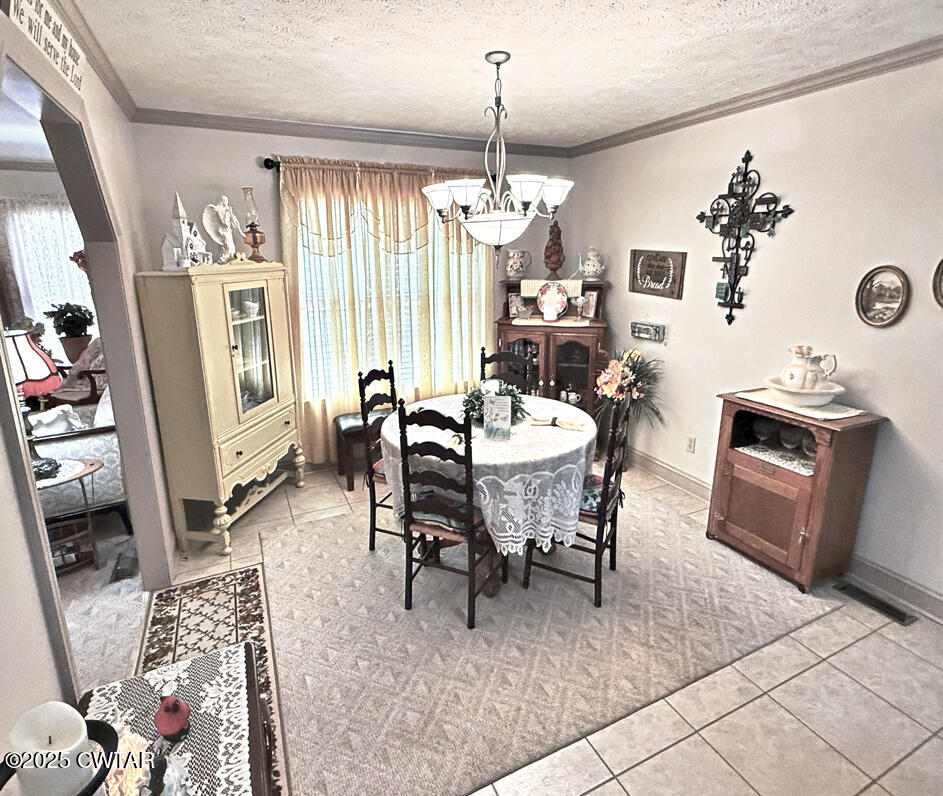 153 Timber Ridge Drive Lexington, TN 38351 - Photo 17 of 29 a view of a dining room with furniture window and wooden floor