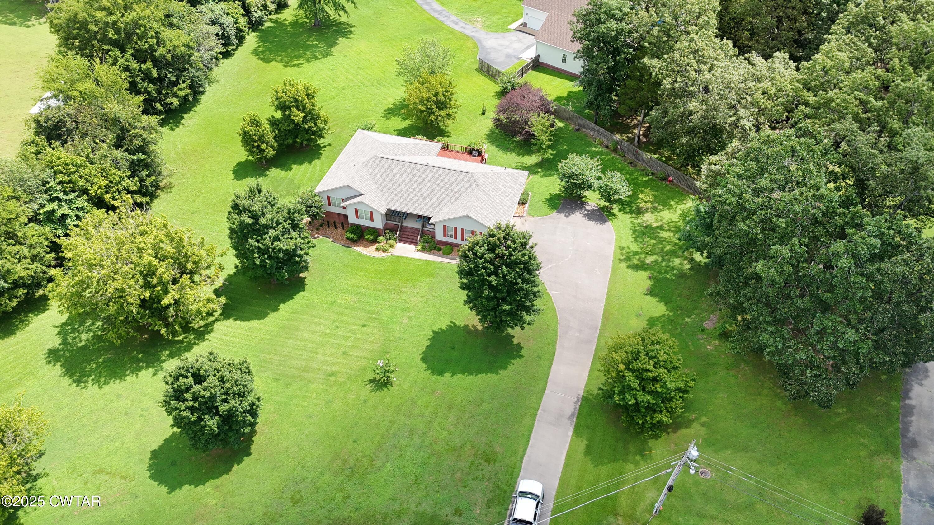 153 Timber Ridge Drive Lexington, TN 38351 - Photo 25 of 29 an aerial view of a house with a yard