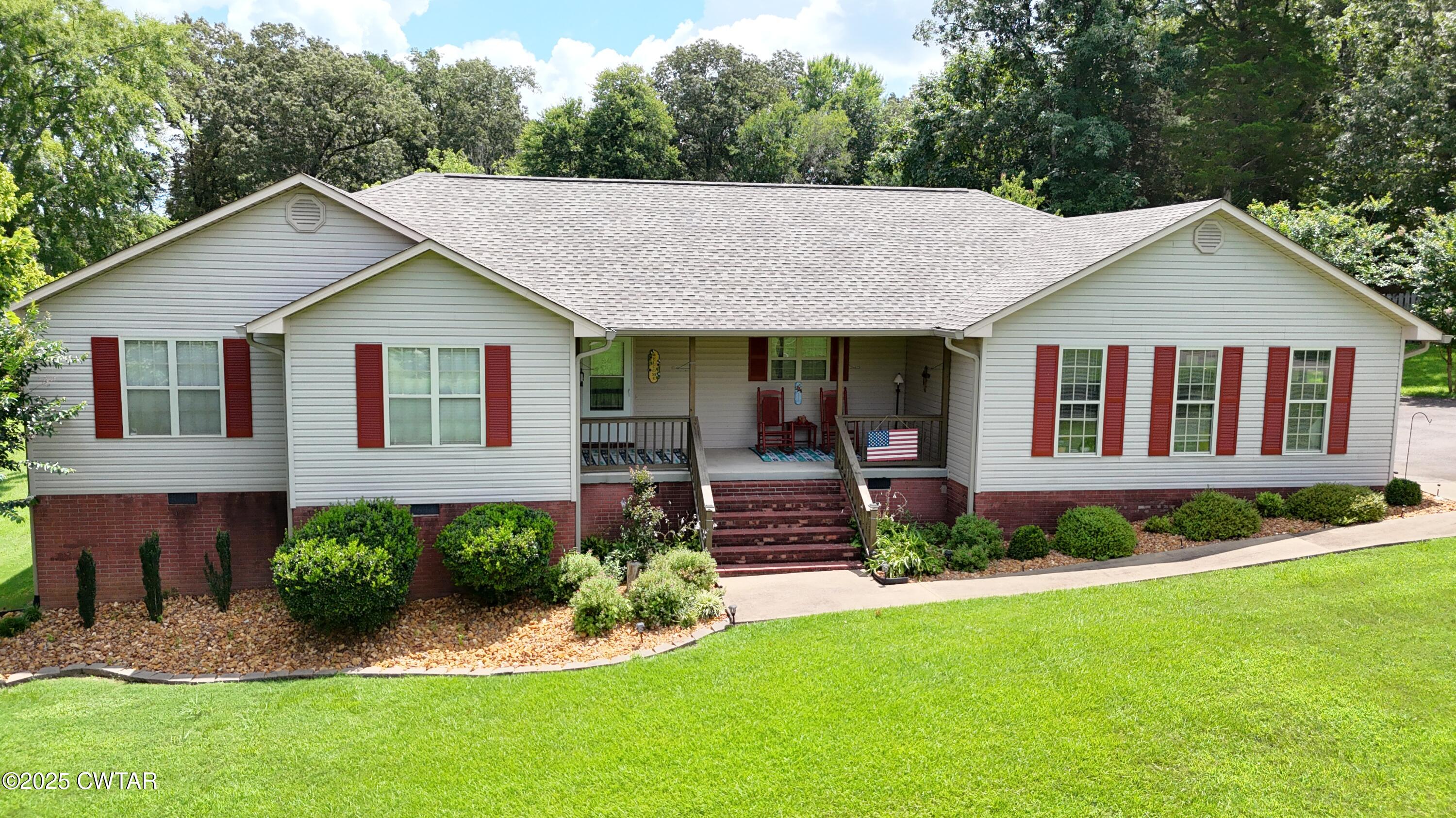 153 Timber Ridge Drive Lexington, TN 38351 - Photo 29 of 29 a house that has a lot of plants in it