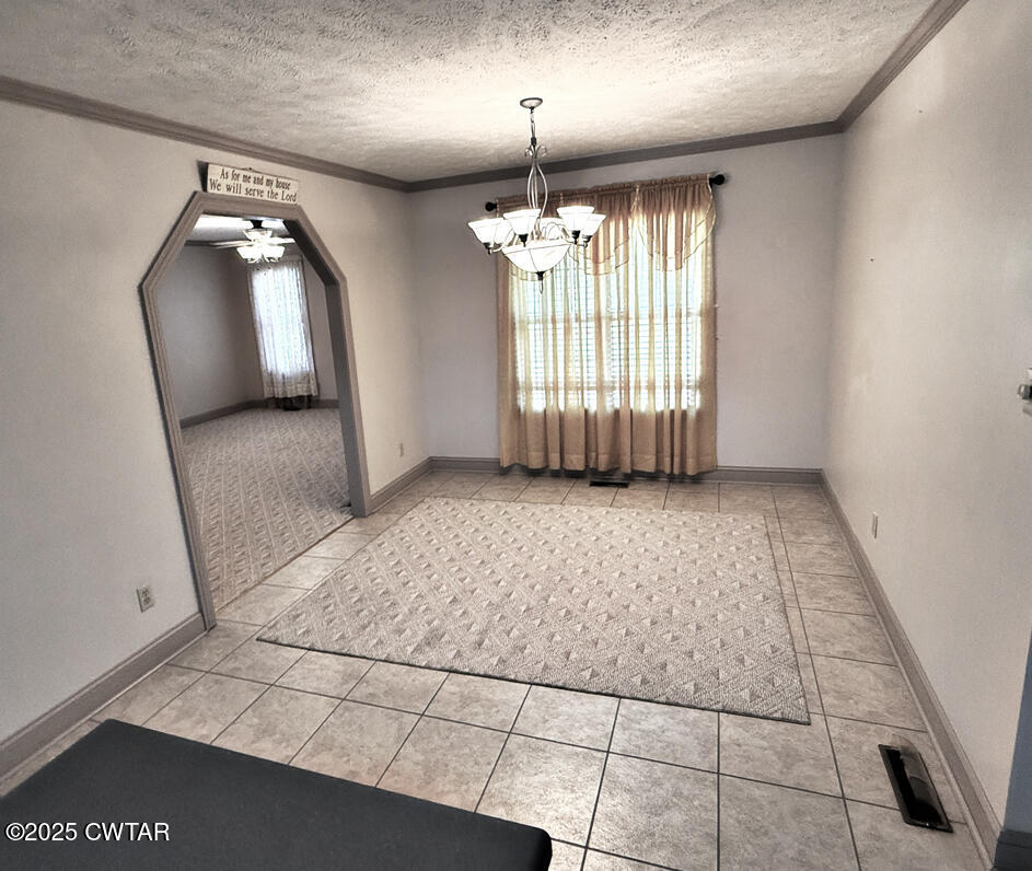 153 Timber Ridge Drive Lexington, TN 38351 - Photo 4 of 29 a view of an empty room with a window