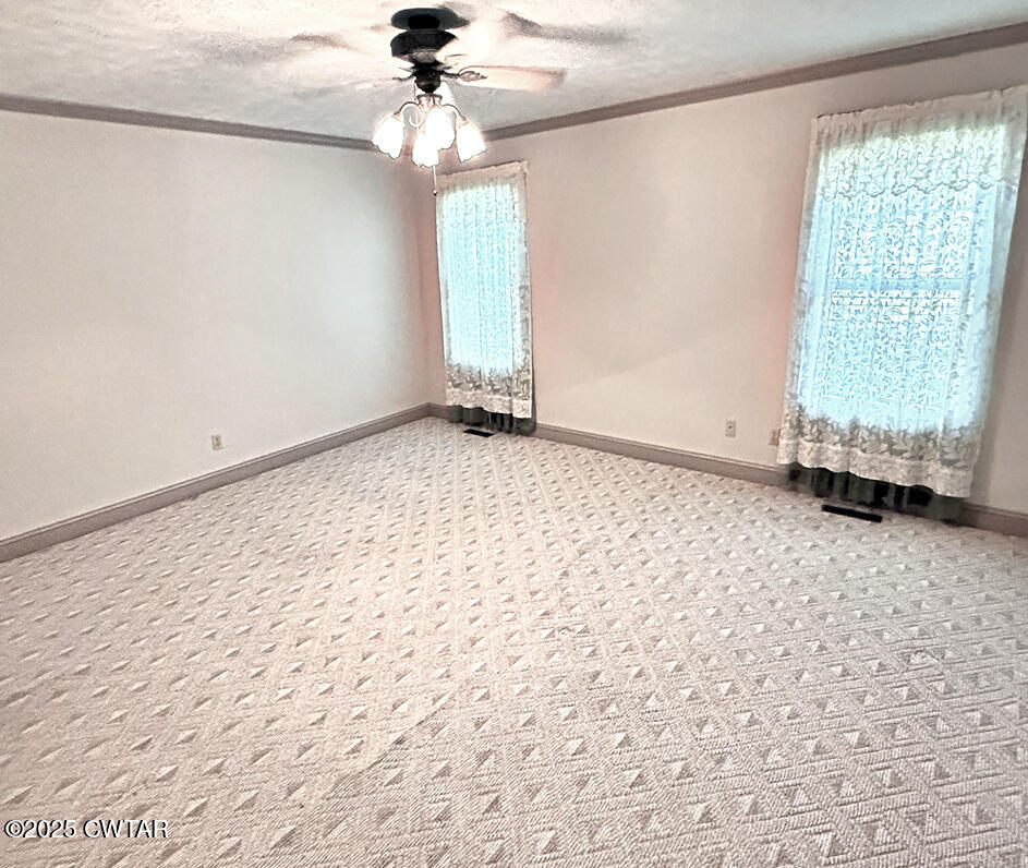 153 Timber Ridge Drive Lexington, TN 38351 - Photo 7 of 29 a view of an empty room with a window