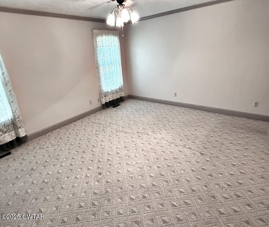 153 Timber Ridge Drive Lexington, TN 38351 - Photo 8 of 29 an empty room with windows