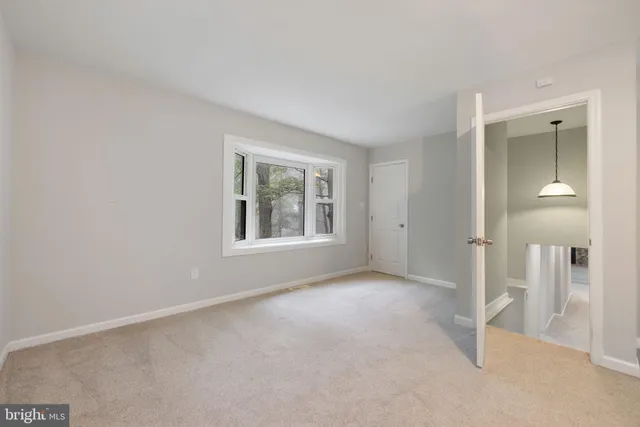 a view of a lush green space with sea